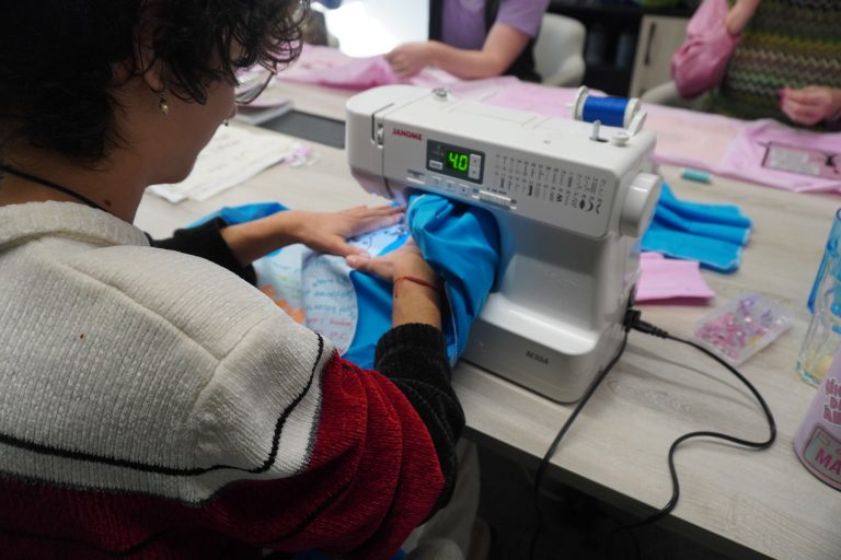 Person with sewing machine